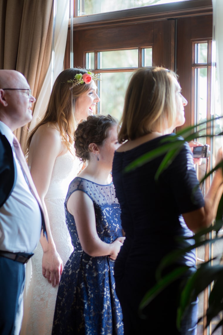 Bride Stephanie waits with her wedding party.