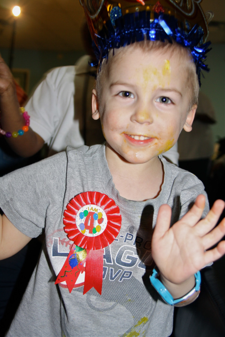 Torian celebrating his birthday with the Birthday Party Project.