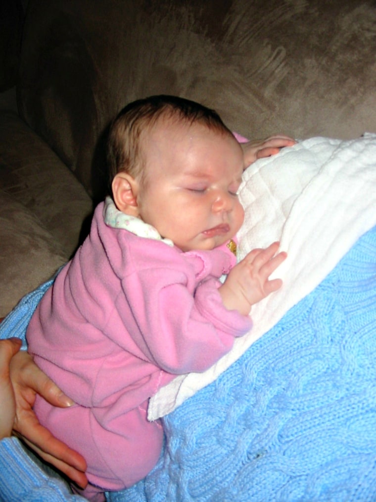 The author was diagnosed with postpartum depression following the birth of her second daughter, shown here as an infant.