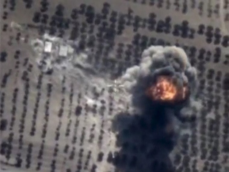 Image: Frame grab taken from Russia's Defence Ministry footage shows explosion in Idlib province, Syria