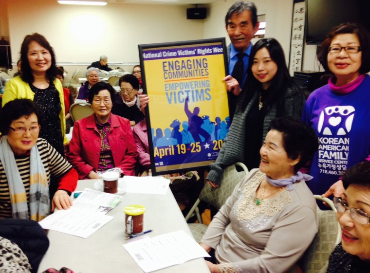 Korean American Family Service Center staff and volunteers conducted awareness workshops at local senior centers. In this photo taken April 22, 2015, volunteers help seniors, who often have a sense of a lack of resources and experience domestic violence, learn about the 24-hour bilingual crisis hotline ready to support them, as well as a whole range of services for victims of violence that are available in Korean and English.