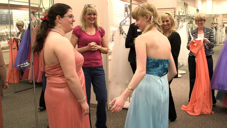 Jessica Sullivan, Terry Sullivan, Caroline McKenzie, Johanna McKenzie, and Laura Osborn try on dresses for the upcoming dance, from HBO's "How to Dance in Ohio."