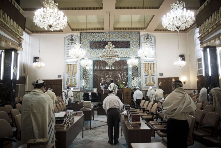 Image: Iranian Jewish men during morning prayers