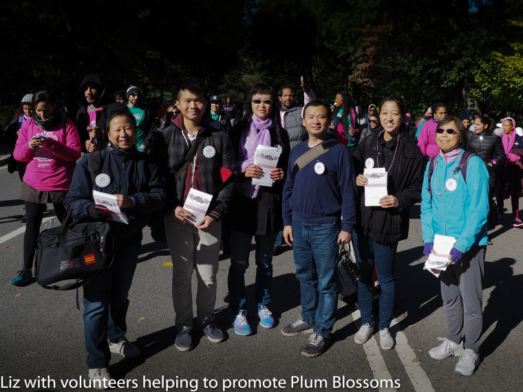 Elizabeth OuYang and volunteers help promote Plum Blossoms during the Making Strides Against Breast Cancer March in Central Park, October 18, 2015.