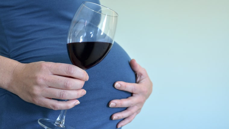 Pregnant woman drinks alcohol