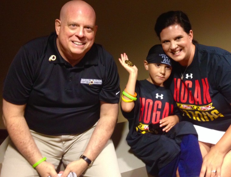 Maryland governor Larry Hogan with Andrew Oberle and his mother, Caroline.