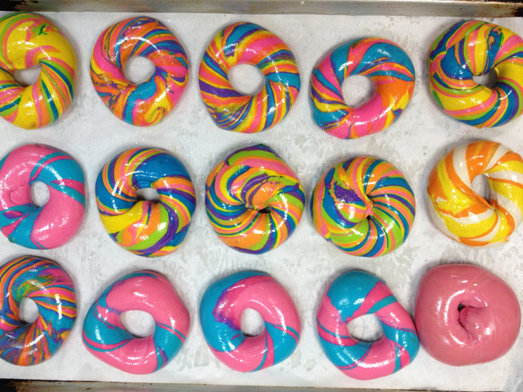 Variety of Rainbow and Psychadelic Rainbow Bagels from Brooklyn's The Bagel Store