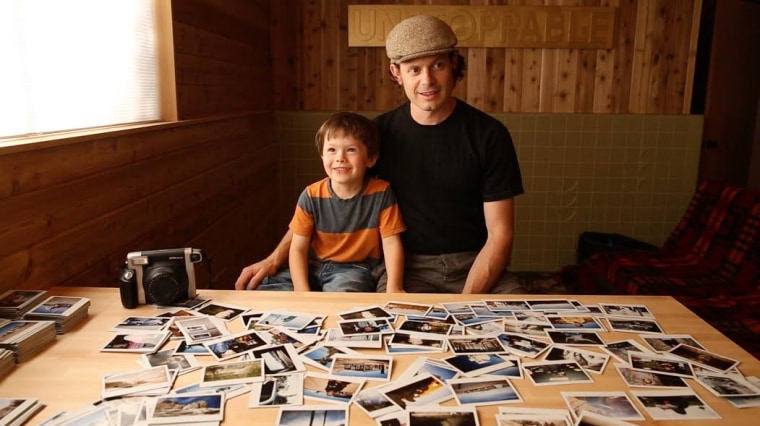 Five-year old photographer Hawkeye huey and his dad Aaron Huey