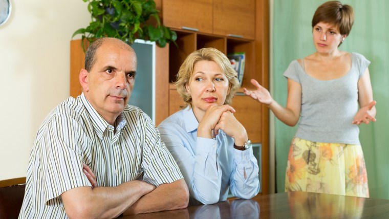 Adult daughter having serious talking with mature parents at home ; Shutterstock ID 205697506; PO: today.com