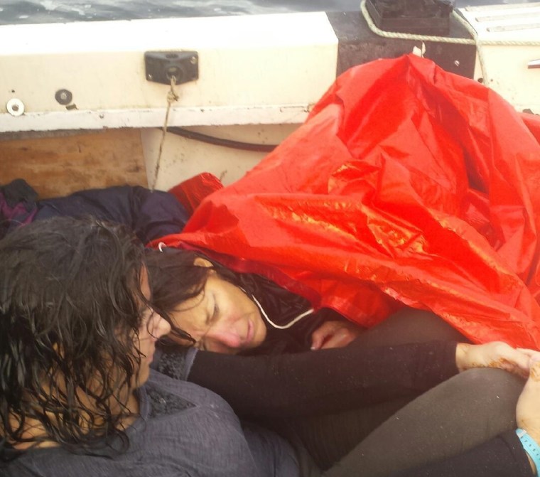 IMAGE: Capsized boat survivors