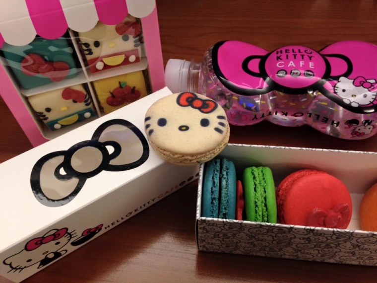 Eager fans line up at the Hello Kitty Cafe Truck to purchase edible treats, such as Hello Kitty-themed macarons.