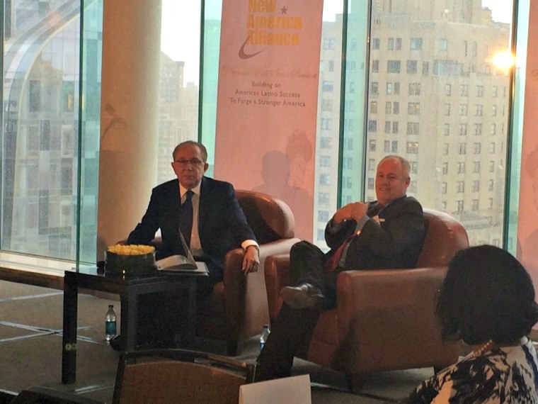 Mickey Ibarra of the Latino Leaders Network (left) and former Albuquerque Mayor Martin Chavez speak at NAA US Mayors Forum.