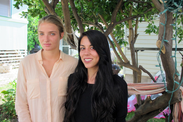 Courtney Wilson, left, and Taylor Guerrero pose for a photo in Honolulu on Wednesday, Oct. 28, 2015.