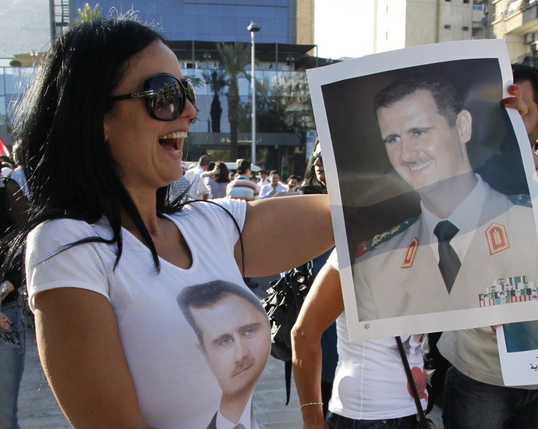 Image: Bashar Assad supporter in Damascus in June 2011