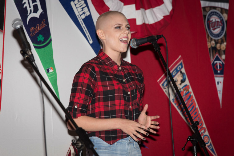 Calysta Bevier sings "Fight Song."