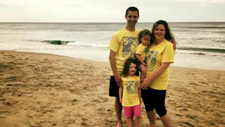 Jami Cavanagh with her husband Chris and their two children; after losing twins to Twin to Twin Transfusion Syndrome, Jami is trying to educate other moms about the warning signs.