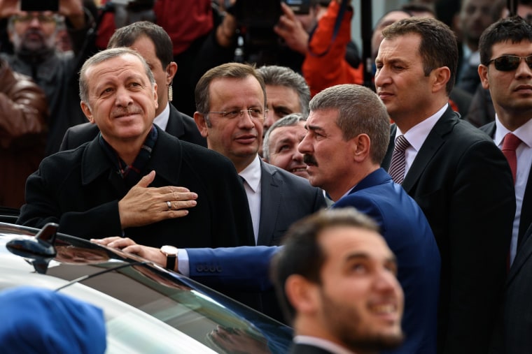 Image:Turkish President Recep Tayyip Erdogan (left) gestures to supporters