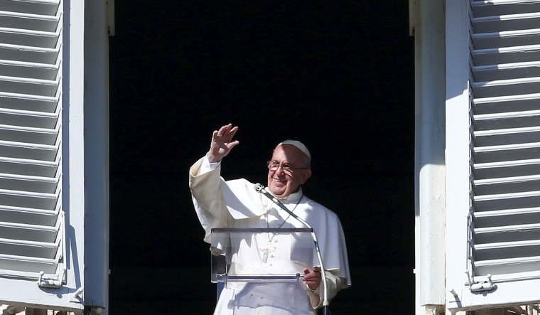 Image: Pope Francis waves during his Sunday Angelus prayer in Saint Peter's square at the Vatican