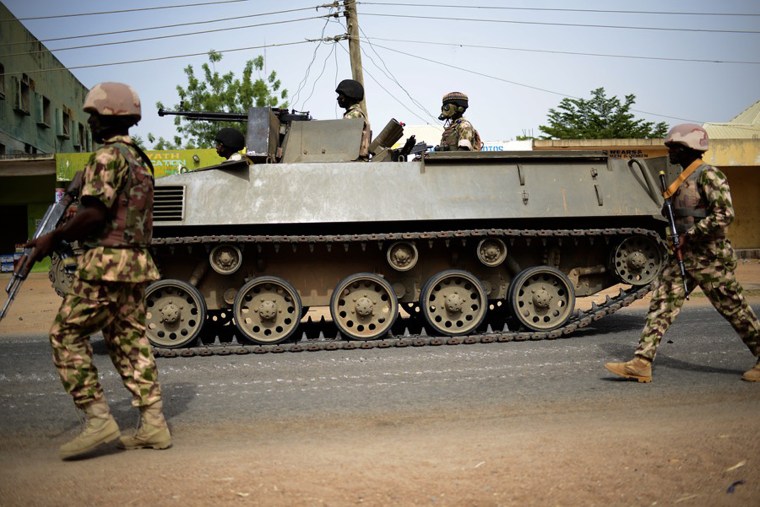 Nigerian troops patrol Mubi in March.