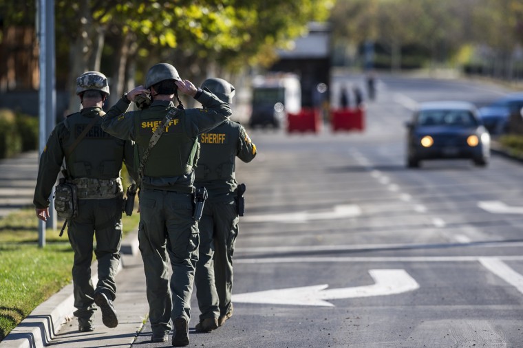 Merced County Sheriff SWAT members enter the University of California, Merced campus after a stabbing spree on campus Nov. 4, 2015.