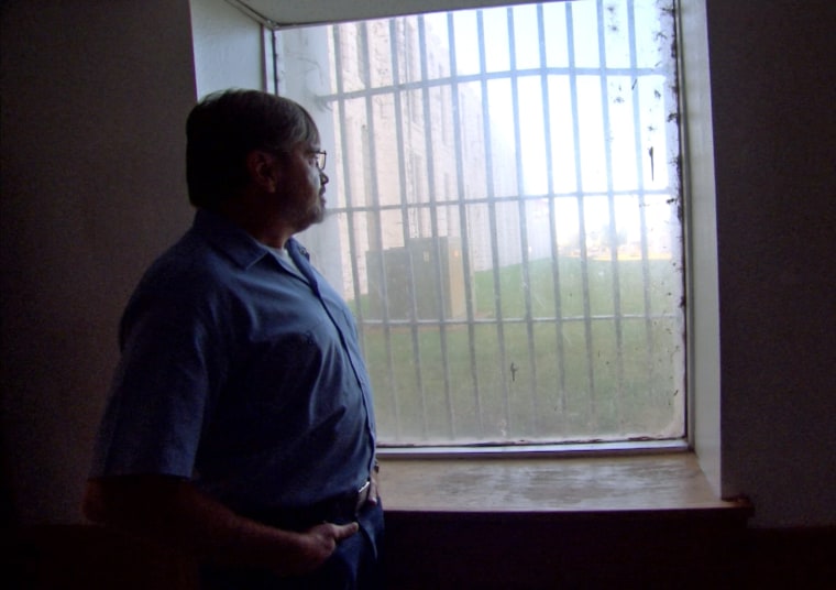 Kevin Ott looks out a window at the Oklahoma State Reformatory in 2015. 