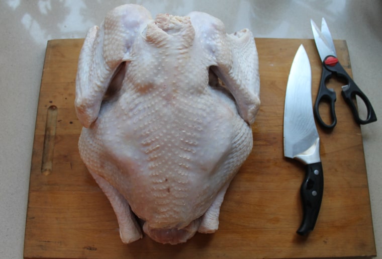 How to Butterfly a Turkey Step-by-Step: Place the turkey breast side down on a cutting board