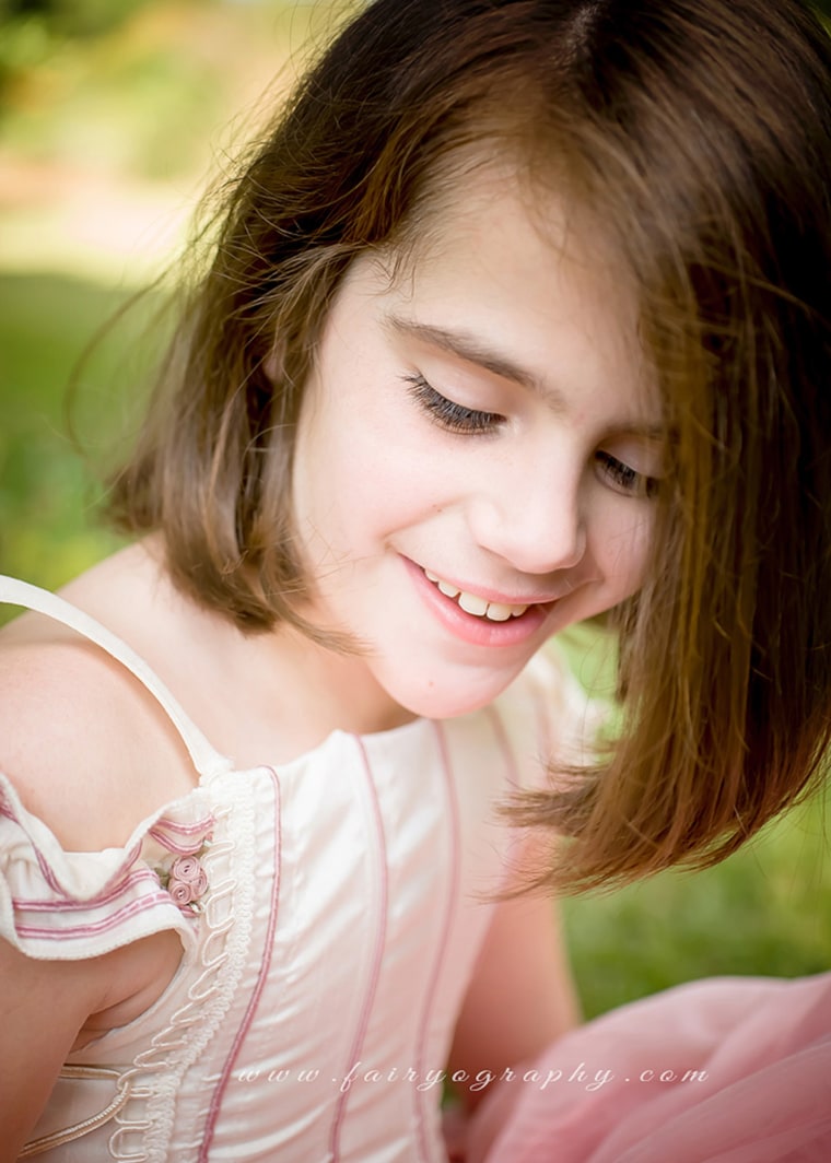 April Foust says her daughter' Gabby, 10, felt like a princess at her photo shoot. Gabby has mitochondrial disease, dysautonomia, autism, global developmental delay and is non-verbal.