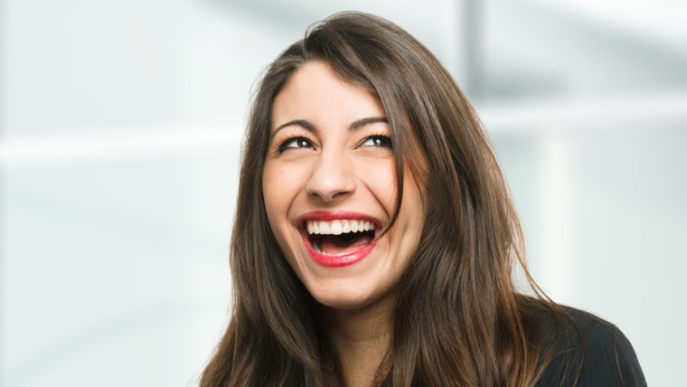 Portrait of a very happy woman laughing; Shutterstock ID 130210283; PO: laugh-stock-tongue-twister-today-tease-151106; Client: TODAY Digital