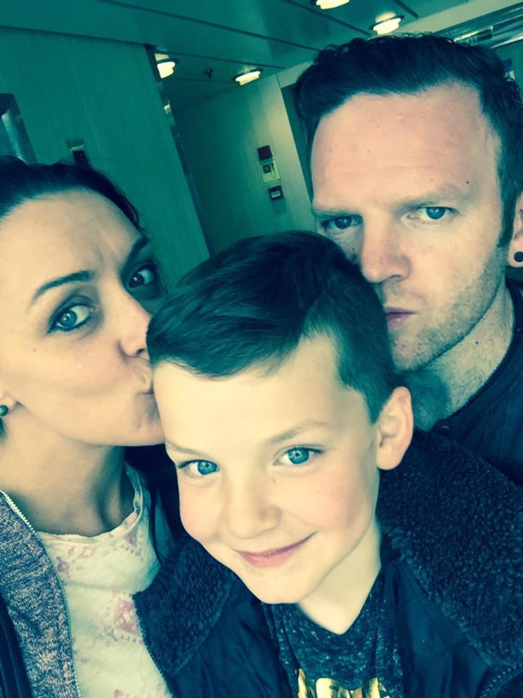 Jake Dooley with his parents