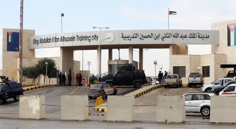 Image: Additional anti-terrorism forces are seen guarding the entrance of King Abdullah Bin Al Hussein Training City