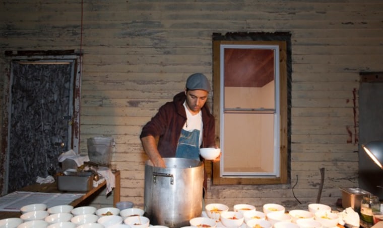 Diego Felix serves out Estofado Andino at The Palms Rockaway in New York City.