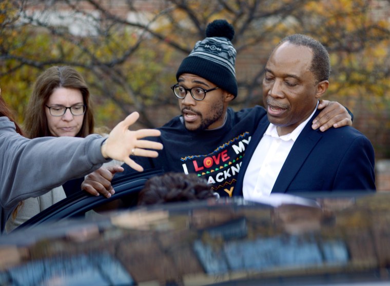 Image: Jonathan Butler enters a car