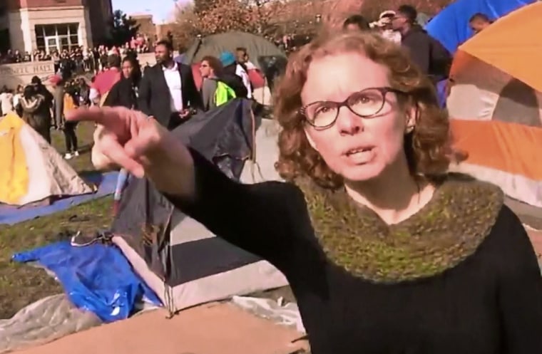 Professor Melissa Click tries to prevent a journalist from filming activists at the University of Missouri.