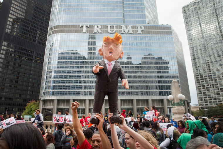 Image: Activists Protest For Immigration Reform And Fair Wages At Trump Tower In Chicago