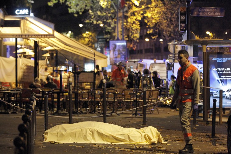 Image: Victim's body in street close to Bataclan concert hall early Saturday