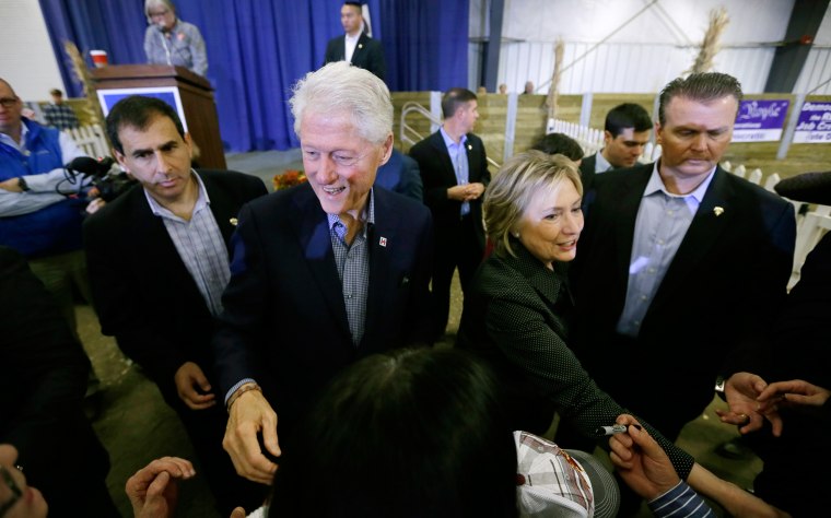 Image: Hillary Rodham Clinton and Bill Clinton greet supporters at the Central Iowa Democrats Fall Barbecue