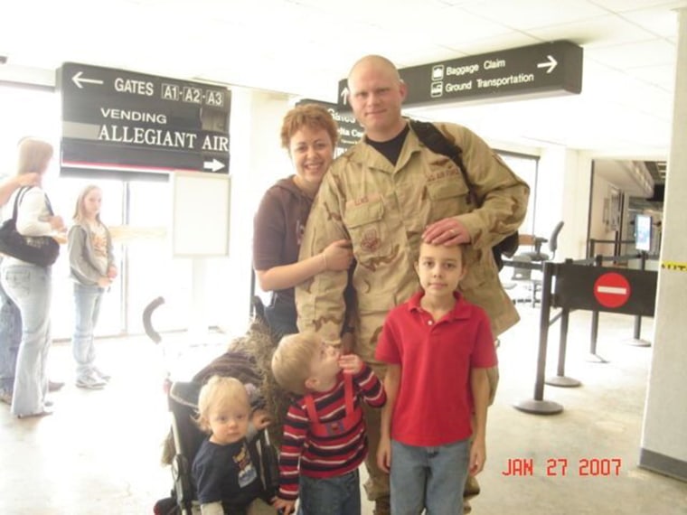 Thera Lewis with her husband, Joshua Lewis, and their children Christopher, Blaine and Noah.