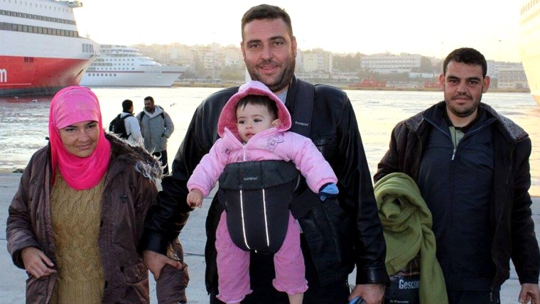 A Syrian family arriving from the Greek islands. Their baby doesn't have socks on. With the winter coming and the refugees only at the beginning of their journeys, frostbite on hands and feet is a big concern for them. Most of their socks are constantly wet which exacerbates the problem.