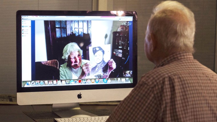 Norwood Thomas, at right, chats on Skype with Joyce Morris, a girl he dated while he was deployed outside London during WWII.