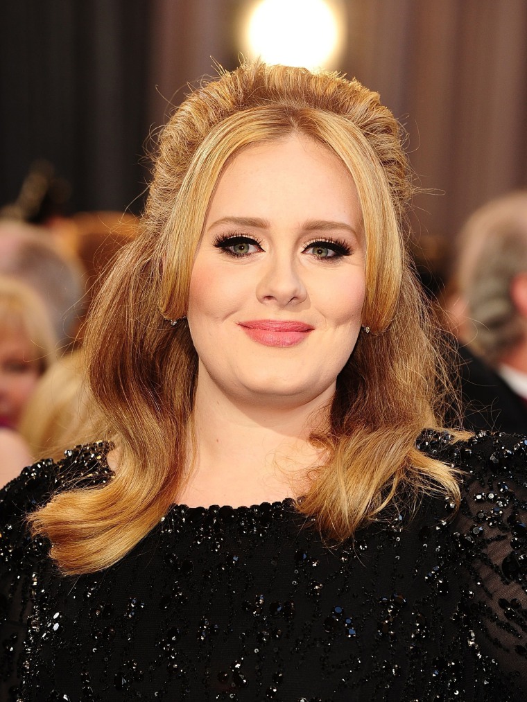 Image: Adele poses for a photo on Feb. 2, 2013.