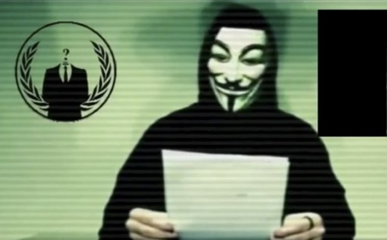Image: Man wearing Anonymous mask