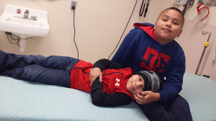 Brothers Juan, 12,  and Javier Salas, 7, of Phoenix both carry rare cancer-causing mutations.