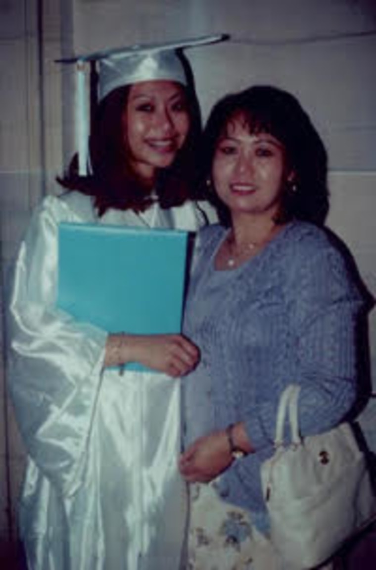 Lundy Khoy celebrates her high school graduation with her mom.