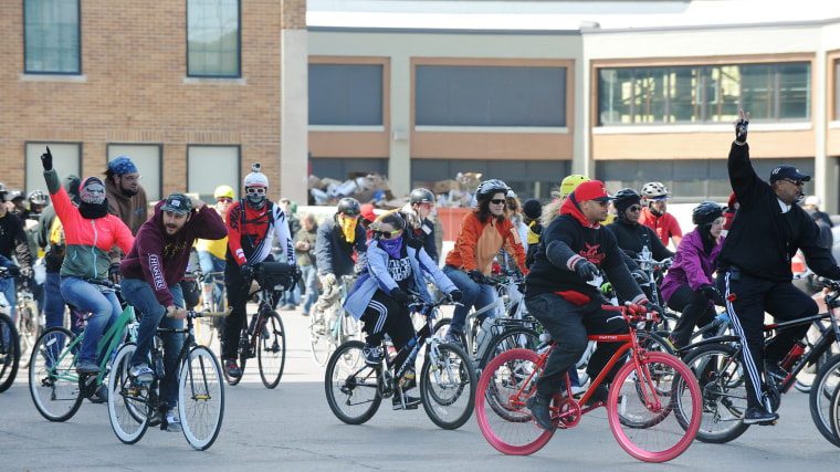 The pack sets out from the starting area in Eastern Market as bikers pedal around the streets of Detroit during Slow Roll's first ride of the season on Sunday, March 29, 2015. Slow Roll is a group of bicyclists who meet once a week for a ride through the city.