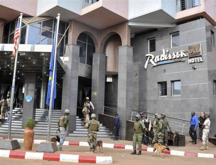 Security forces surround the Radisson Blu hotel during a hostage situation in Bamako, Mali on Nov. 20. Islamic extremists armed with guns and throwing grenades stormed the hotel in Mali's capital, killing more than two dozen people and briefly taking scores more hostage.