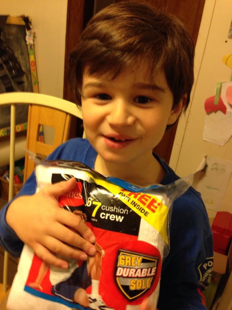 "My 6-year-old son Gabriel, who happens to be nonverbal w/autism, is so happy to be donating socks to the Veterans hospital!"
