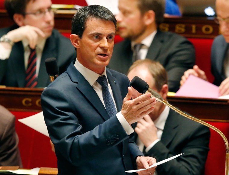 Image: French Prime Minister Manuel Valls gestures as he speaks