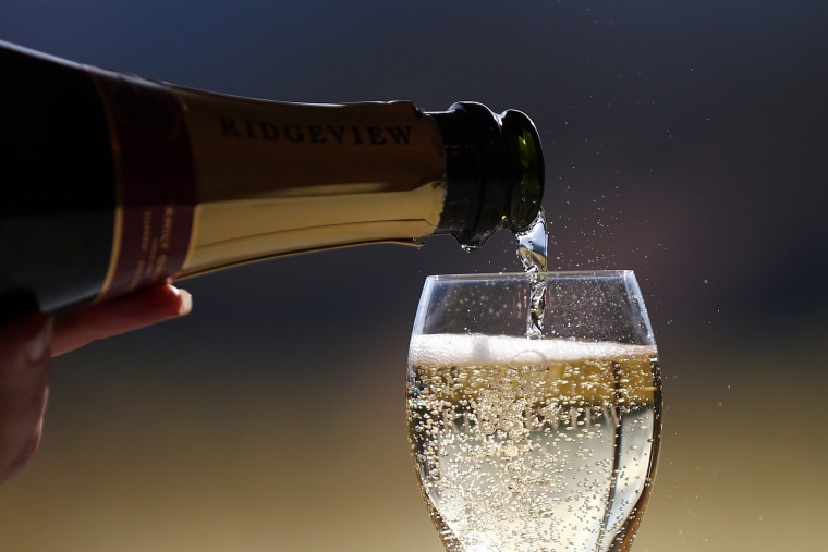 Image: Sparkling wine is poured into a glass