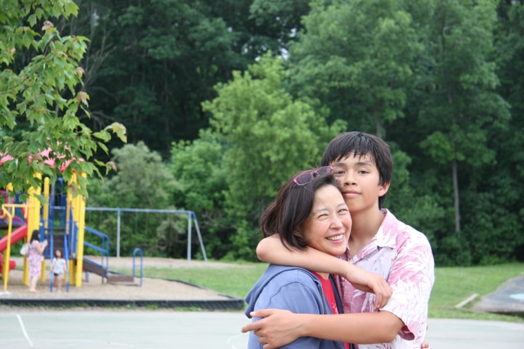 Frances Kai-Hwa Wang with her son at 5th grade graduation in Michigan, June 2015