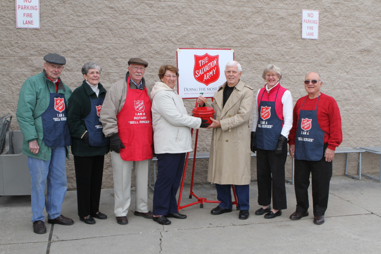 Image: Dick and Ruth Jen Unger, center, donated a gold coin anonymously to their local Salvation Army kettle in Gettysburg